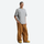 Breathable 3-layer ski pullover with balloon pants - coffee brown snow pants with gray tee, for cold-weather winter sports