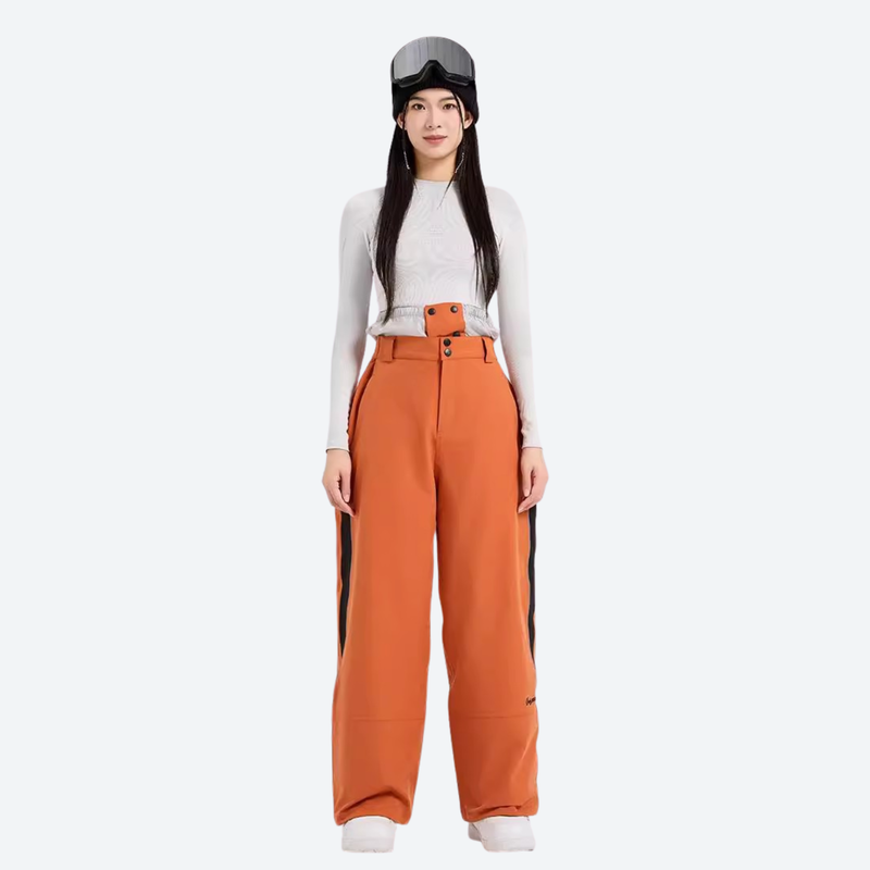 Women's colorblock waterproof snow jacket and pants - orange wide-leg snow pants with white top, for powder and piste riding