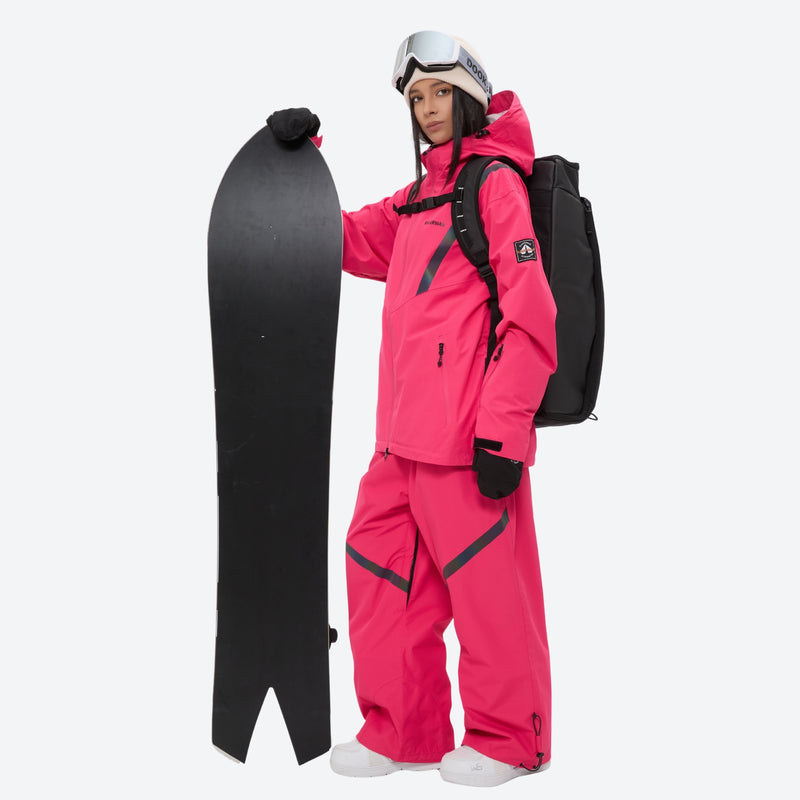 Waterproof snow jacket and pants set - rose pink, on-model front with snowboard and backpack, for resort and backcountry days