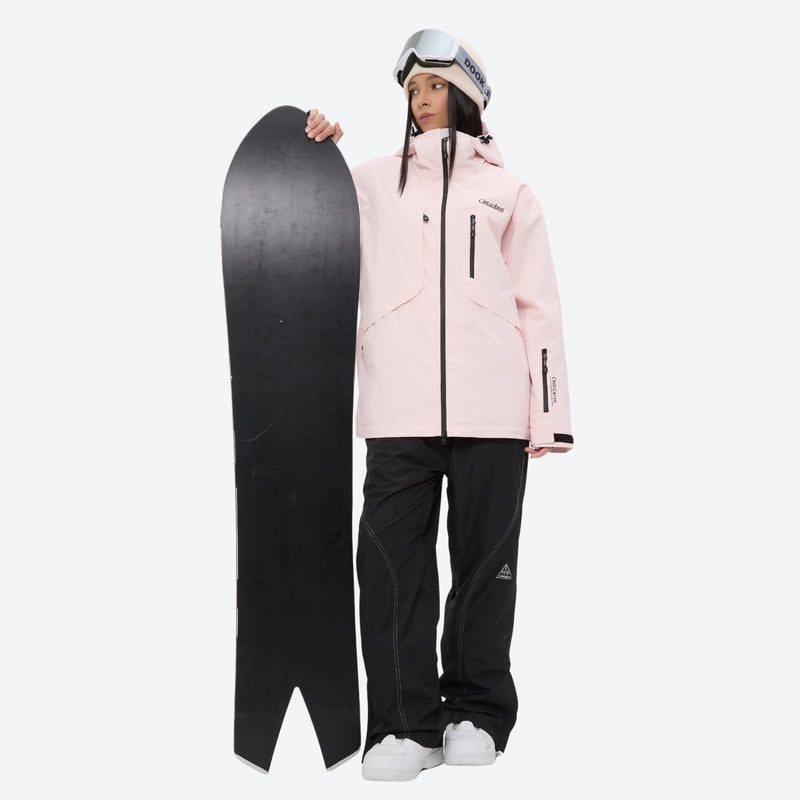 Breathable ski jacket and snow pants combo - light pink, on-model front with upright snowboard, for skiing and snowboarding