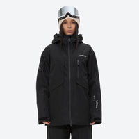 
                  
                    Women's waterproof 2L snow jacket and bib pants series - black jacket with black bib pants, on-model full-body front view
                  
                
