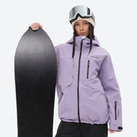 
                  
                    Waterproof snow jacket and pants set - lavender, on-model front with upright snowboard, for resort and backcountry days
                  
                