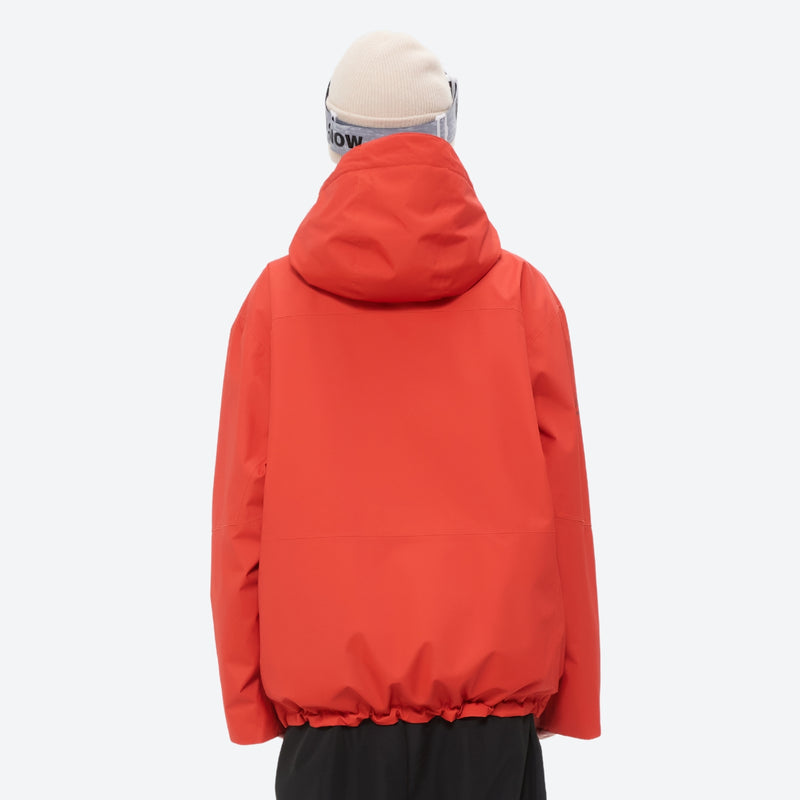 Colorblock ski jacket and pants set - women's solid orange-red, on-model back hood view, for cold-weather winter sports