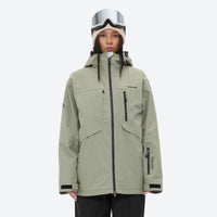 
                  
                    Breathable ski jacket and snow pants combo - sage green, on-model front view, for resort and backcountry days
                  
                