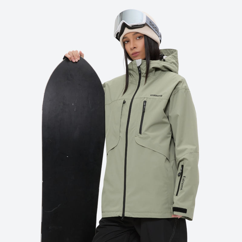 Colorblock snowboard jacket and pants set - sage green, on-model front with upright snowboard, for powder and piste riding