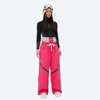 
                  
                    Women's waterproof snow jacket and pants set - pink snow pants with black top, for cold-weather winter sports
                  
                