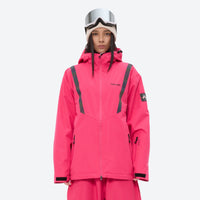 
                  
                    Women's waterproof snow jacket and pants set - pink jacket, on-model front view, for resort and street wear
                  
                