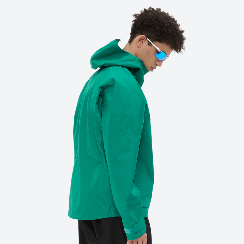 Men's waterproof 3L hardshell ski jacket - teal hardshell jacket, on-model side view, for cold-weather winter sports