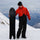 Waterproof 2L snow jacket and pants set - orange-red and black colorblock, for resort and powder riding