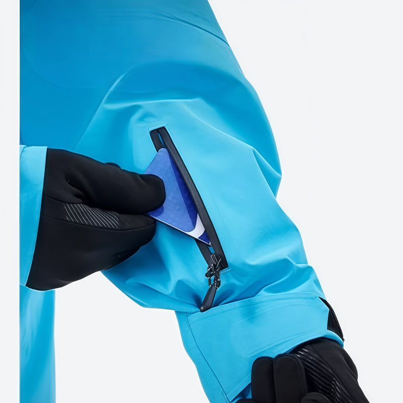 Men's waterproof 3L insulated snow jacket - blue, sleeve pocket close-up with hand holding card, for powder and piste riding