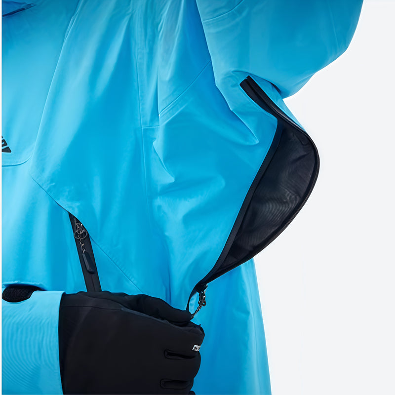 Men's insulated snowboard jacket with cuff gaiters - blue, underarm vent close-up with hand, for resort and backcountry days
