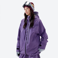 
                  
                    Women's breathable 3-layer padded ski jacket - purple insulated jacket, on-model front view, for resort and backcountry days
                  
                