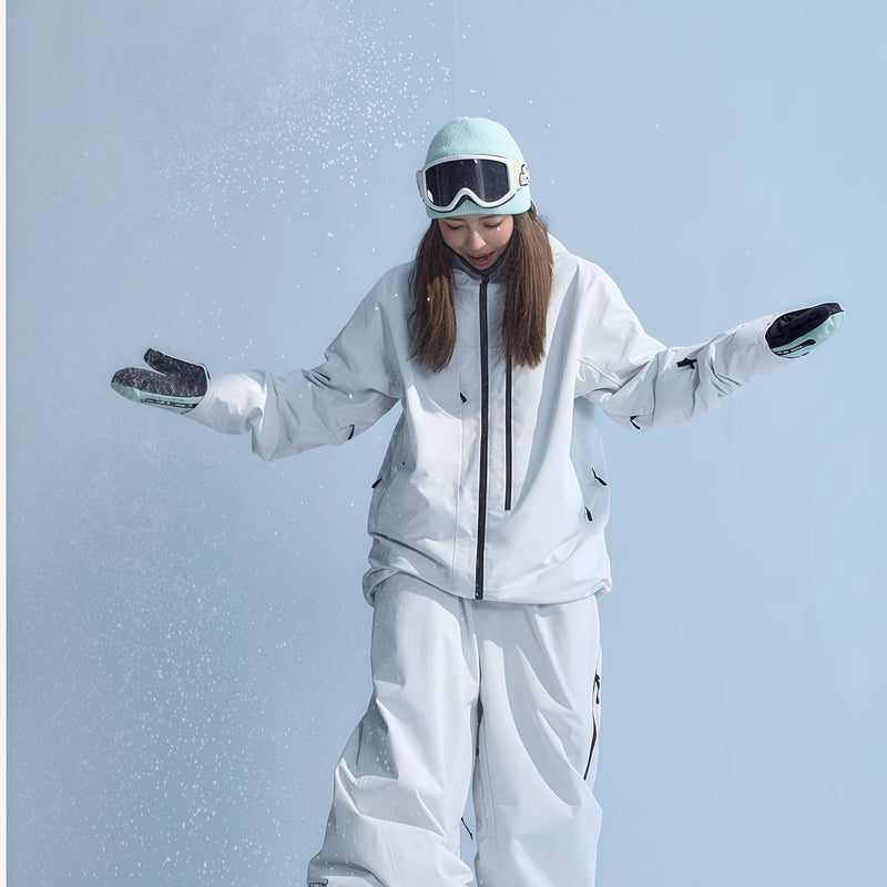 Women's insulated snowboard jacket with snow skirt - white jacket with white pants, for resort and backcountry days