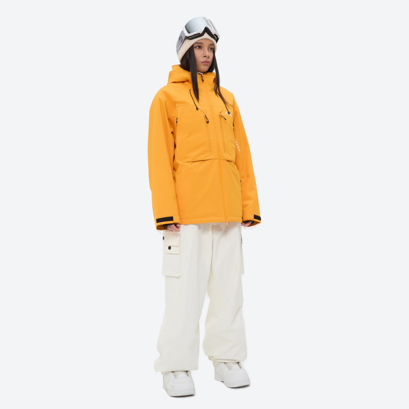 Women's waterproof 3L snow jacket and pants - mustard yellow anorak jacket with white pants, for cold-weather winter sports