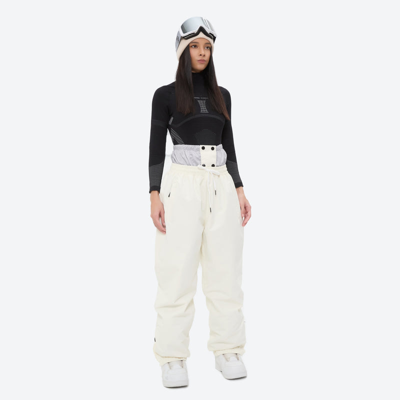Women's waterproof 3L snow jacket and pants - white snow pants with black top, for resort and backcountry days