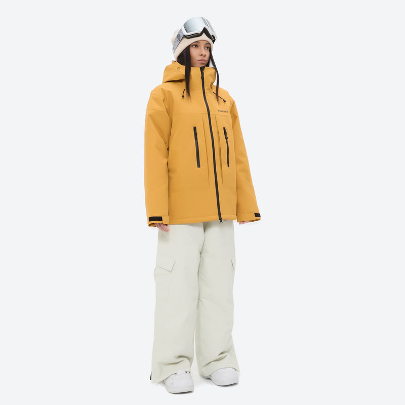 Breathable ski jacket with quilted lining - mustard yellow jacket with white pants, for resort and backcountry days