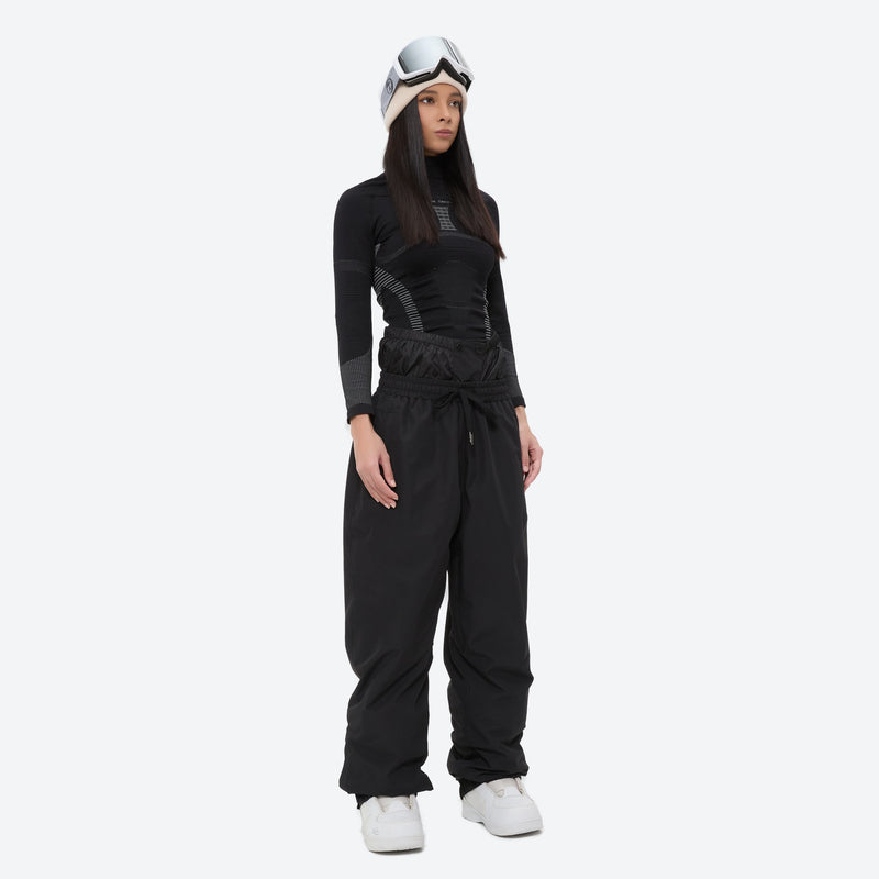 Unisex 2-layer snowboard jacket and pants - black snow pants with black top, on-model front view, for resort and street wear