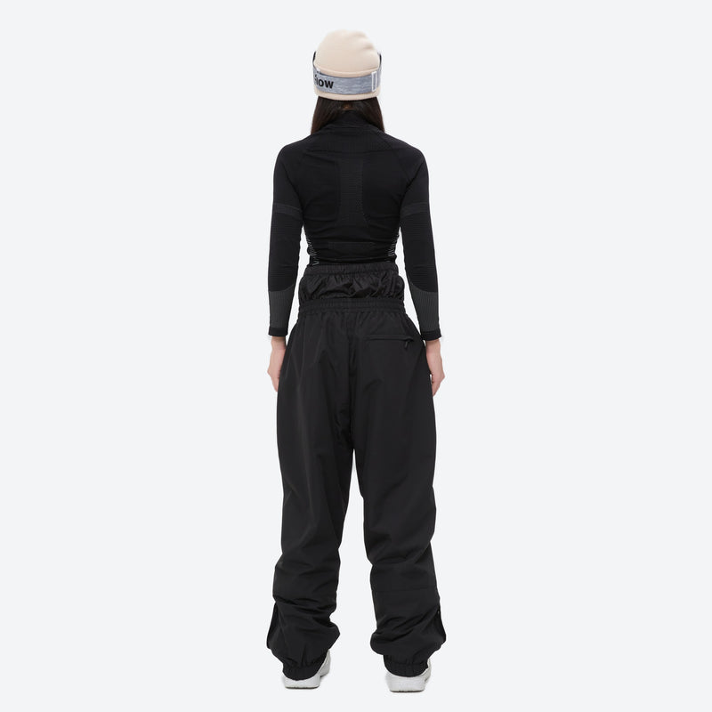 Breathable ski jacket with taped line details - black snow pants with black top, for cold-weather winter sports
