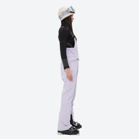 
                  
                    Women's 3-layer breathable ski suit set - lavender bib pants, on-model side view, for cold-weather winter sports
                  
                
