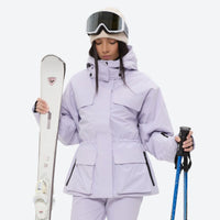 
                  
                    Women's 3-layer breathable ski suit set - lavender, front with upright skis and poles, for resort and cross-country days
                  
                