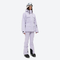 
                  
                    Women's fur trim hood snow jacket with suspender bibs - lavender jacket with lavender bib pants, for snowy mountain travel
                  
                