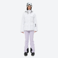 
                  
                    Women's fur trim hood snow jacket with suspender bibs - white jacket with lavender bib pants, for cold-weather winter sports
                  
                