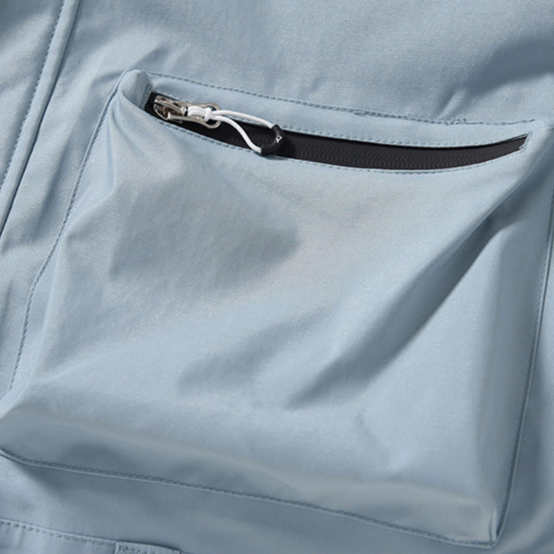Unisex 2-layer snowboard one-piece suit - ice blue one-piece suit, zip pocket close-up detail, for cold-weather winter sports