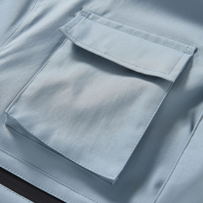Unisex 2-layer snowboard one-piece suit - ice blue one-piece suit, flap pocket close-up detail, for skiing and snowboarding