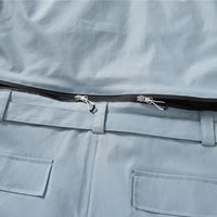 
                  
                    Breathable full-body ski suit with waist belt - ice blue one-piece suit, for powder days and winter commute
                  
                