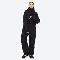 
                  
                    Unisex 2-layer snowboard one-piece suit - black one-piece suit, on-model three-quarter front view, for resort and street wear
                  
                